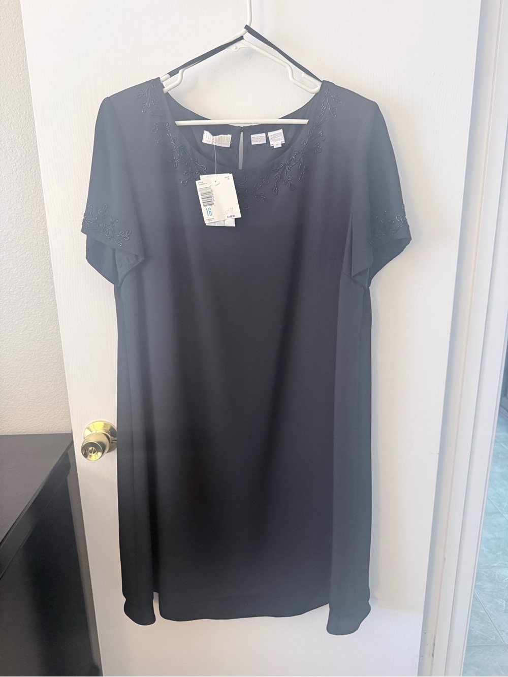 Classic Black Midi Dress with Embroidered Neckline